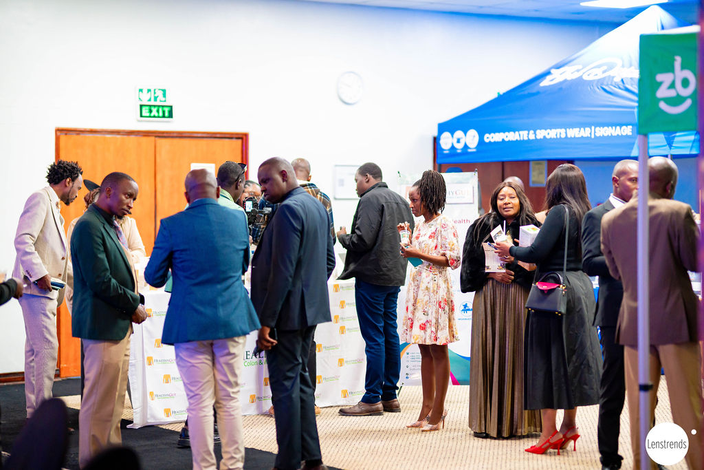 Adventist professionals networking at an ASI ZWUC exhibition event